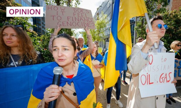 Ukrainian protesters in Brussels, where EU leaders are meeting this week to discuss energy and food security as Russia's onslaught continues. Olivier Matthys/AP/Shutterstock.