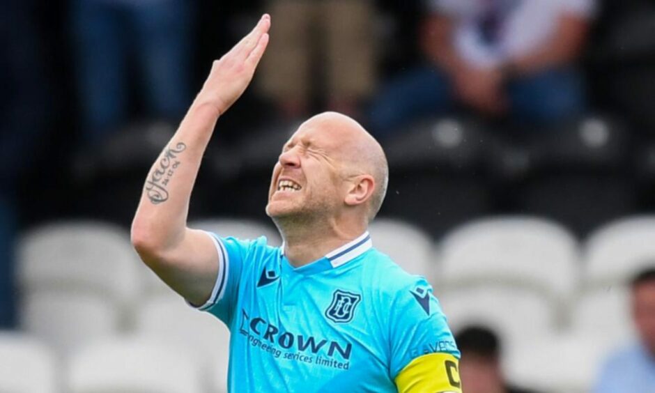 Dundee skipper Charlie Adam after his costly error at St Mirren.