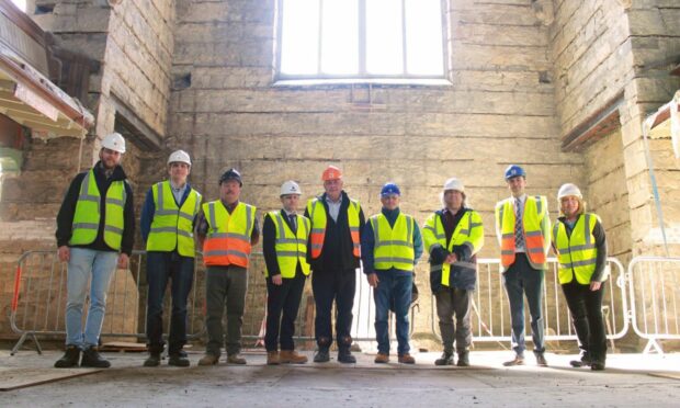 Jill McGrath, YMCA Tayside CEO (right), with some of the people responsible for the building work.