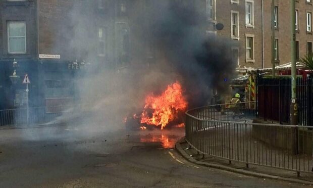 Driver pulled to safety after ‘ferocious’ car fire on Dundee road