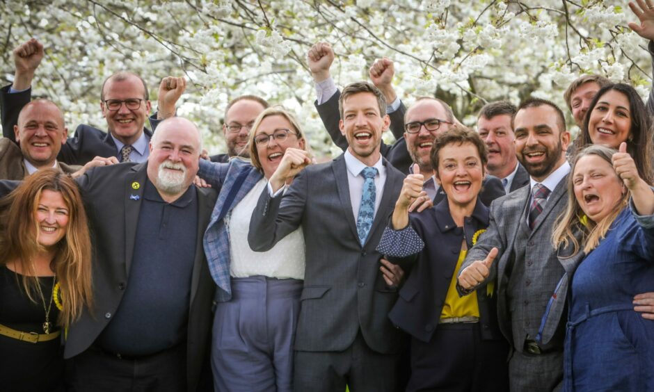 The SNP party celebrating a majority win in Dundee.