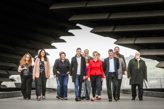 First Minister Nicola Sturgeon with Dundee's newly elected councillors outside the V & A in Dundee.