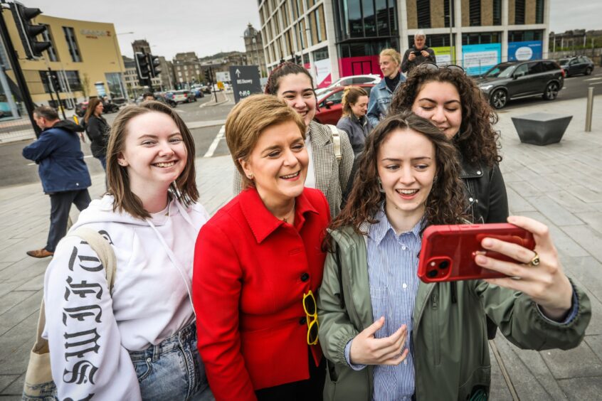 Nicola Sturgeon posing for selfies in Dundee