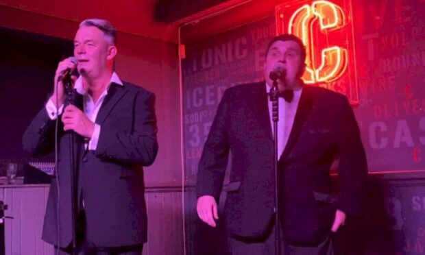 The Singing Cabbies are Jimmy Smart, left, and Wayne O'Hare.