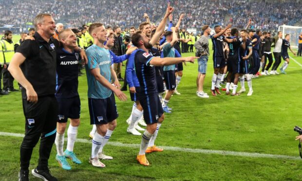 Hertha celebrate survival