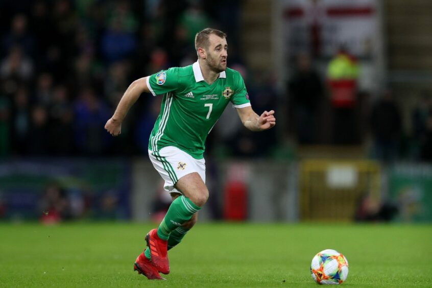 Dundee winger Niall McGinn in action for Northern Ireland.