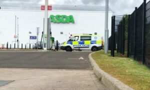 Asda Kirkton with a police van there