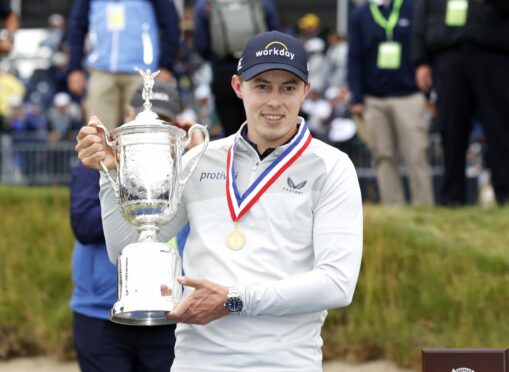 Matt Fitzpatrick with the championship trophy after his victory in Boston on Sunday.