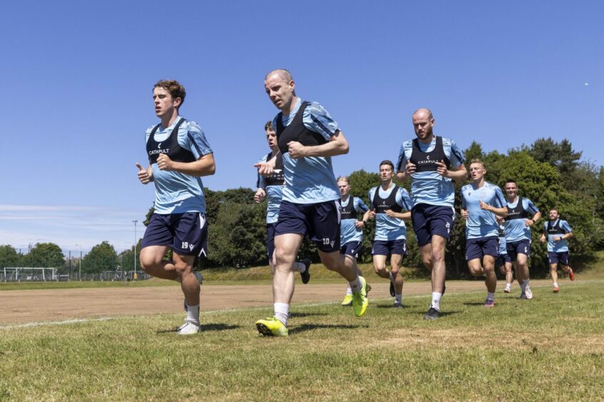 Paul McGowan (front, right) in pre-season training with Dundee