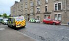 Police on Balmore Street on Friday morning.
