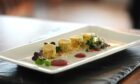 Salmon Cannelloni with mixed berry puree, parmesan tuille and Micro Salad from Bridgeview Station Restaurant.