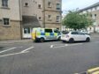 Police at Kinnoull Street after being called to an assault and robbery.