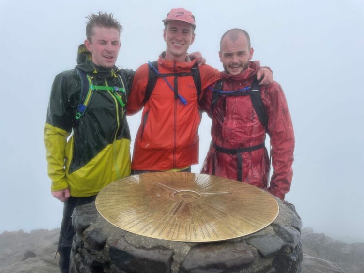 Thomas Sinclair, Andrew Fair and Finn Sutherland at the top of Snowdon.