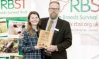 Rare Breeds Survival Trust champion of the year award-winner Alice Lennox with the trust's chairman John Atkinson.