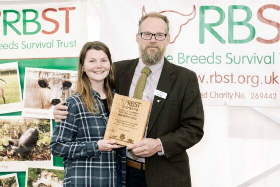 Rare Breeds Survival Trust champion of the year award-winner Alice Lennox with the trust's chairman John Atkinson.