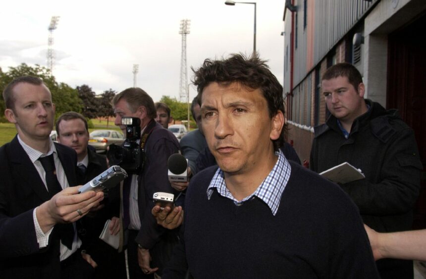 Ivano Bonetti faces the media after he was given his jotters in July 2002 following a day of Dens drama.