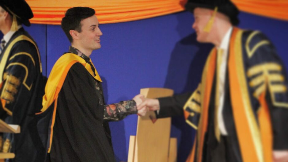 Stuart Russell graduates from university after taking up media studies courses