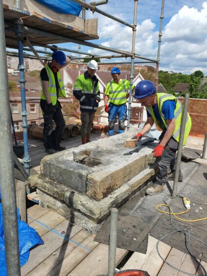 Contractor carrying out repairs to Inverkeithing Town House.