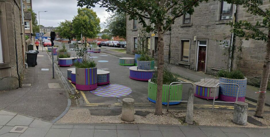 Recently installed planters and seating on Craigie Street.
