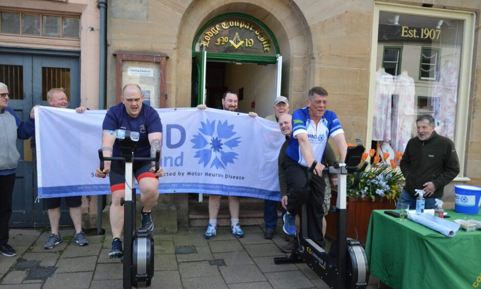 Graeme Bain and colleagues during the sponsored cycle in Cupar.