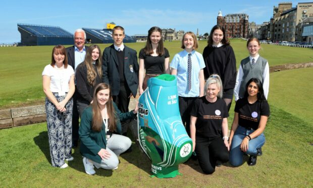 Launch of the Big Bag Trail in St Andrews with golf bags designed by pupils from Madras & St Leonards School which are in place around the town: Rubie McNeill, Stuart Monks, Iona Turner ( St Leonards), Ollie Sanderson, Anna Easton & Lily Drage,(all other pupils are Madras) with CHAS & Scottish Sports Futures charities representatives