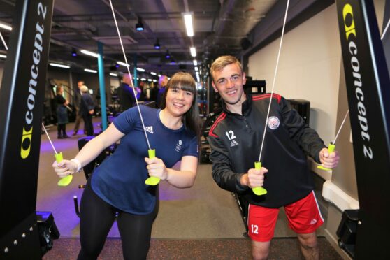 Team GB curling gold medallist Hailey Duff  trying out one of the new machines with Brechin City footballer Michael Cruickshank. Pic: Gareth Jennings/DCT Media.