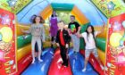 Children enjoying the bouncy castle at Broughty Ferry Baptist Church. Picture Gareth Jennings.