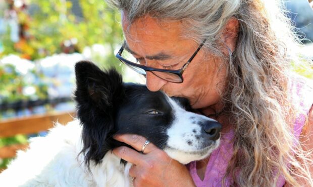 Allana Urquhart with collie Luna at the garden centre.