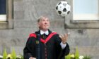 Sir Kenny Dalglish with his honorary degree.
