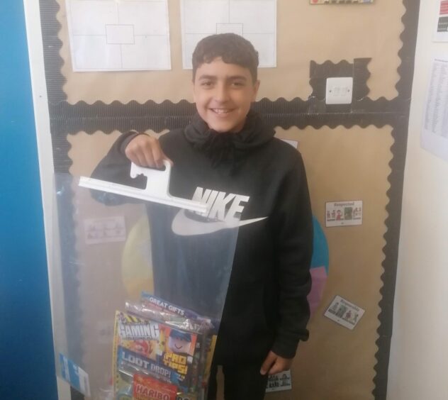 Yaseen was presented with his prize at his school, Barnhill.