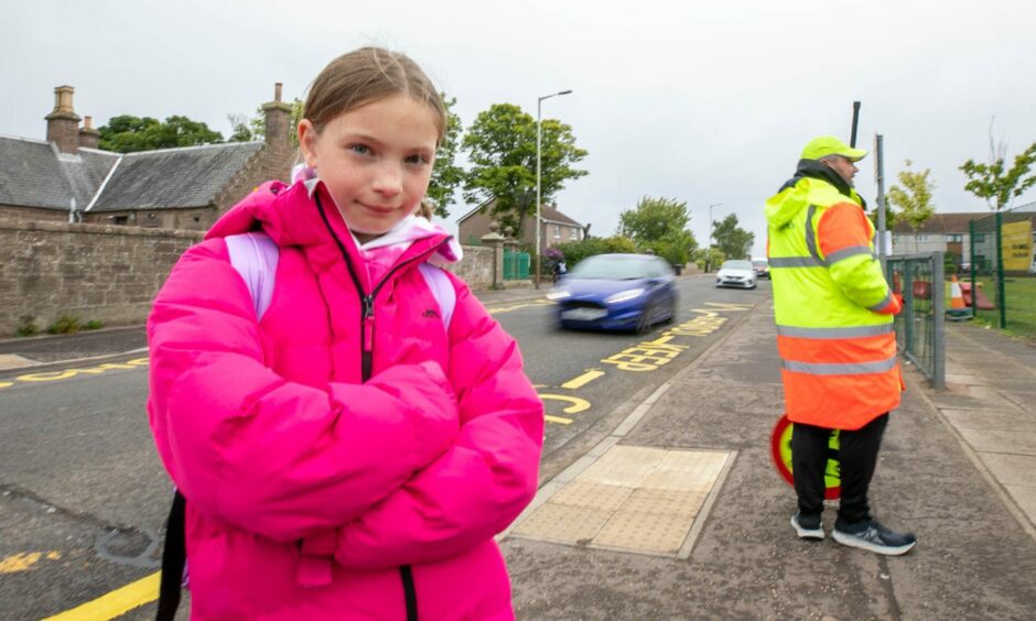 Lily Souter led a campaign to protect Warddykes Primary School lollipop man Steven Sterricks from dodgy drivers. Image: Kim Cessford/DC Thomson.