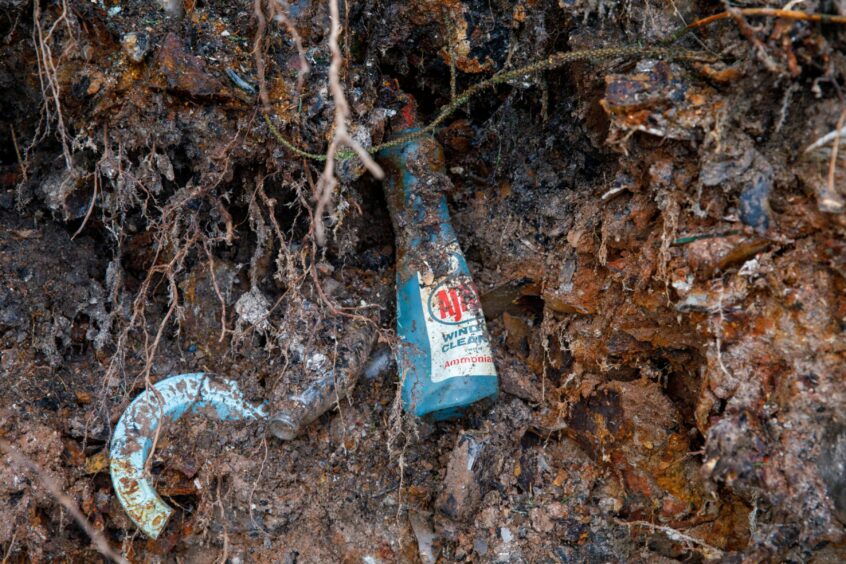 An old bottle which once contained household cleaner unearthed near Doune in 2021.