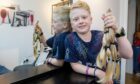 Logan Reid, 10, wasn't allowed to grow his hair out while living in Dubai.