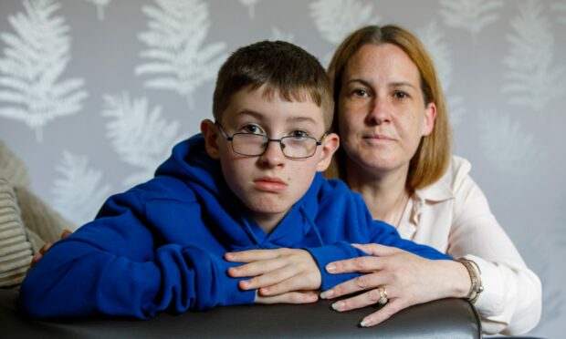 Rhys Hutton has been left a 'broken boy' by his wait to find out where he will go to high school, says mum Roseanne. Pictures by Kenny Smith/DCT Media.