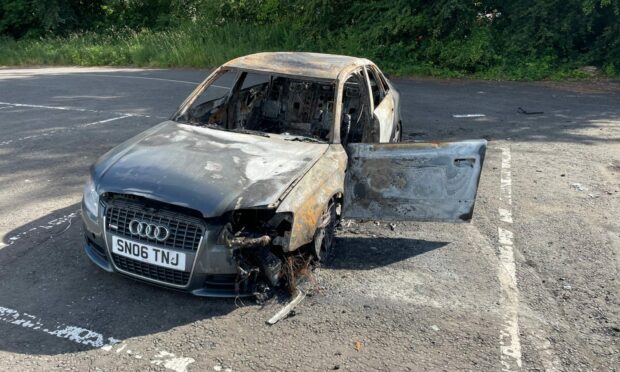 One of the burnt-out cars in Brechin.