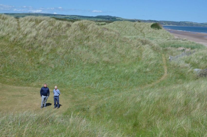 Davud and John walking on the dunes at Montrose Links