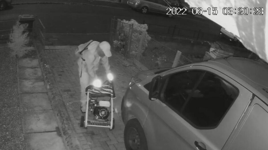 CCTV captures the theft of the petrol power washer.