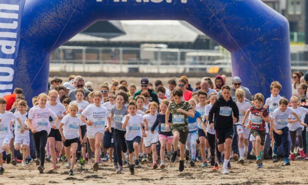 The Chariots of Fire Beach Race attracts hundreds of runners. Pictre Steve MacDougall/DCTMedia.