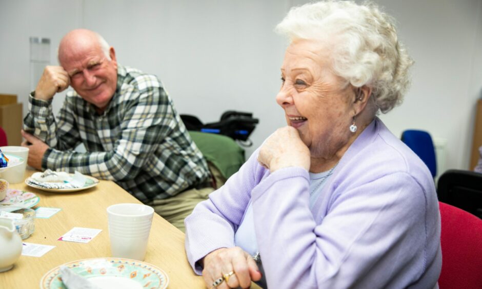 Ronnie Fenton speaks to other carers at the Kirkcaldy dementia centre