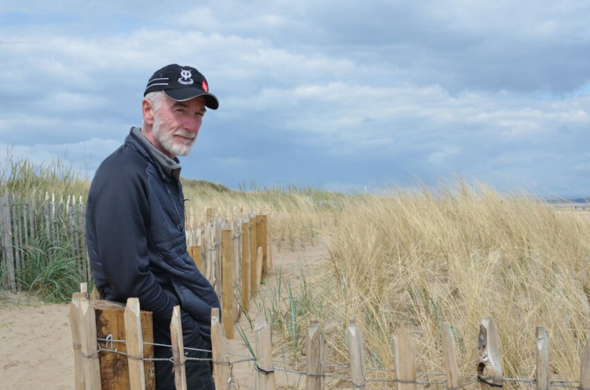Ranald Strachan on the beach at St Andrews
