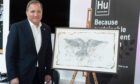 Former Swedish prime minister Stefan Lofven with Frank To's artwork After Thought