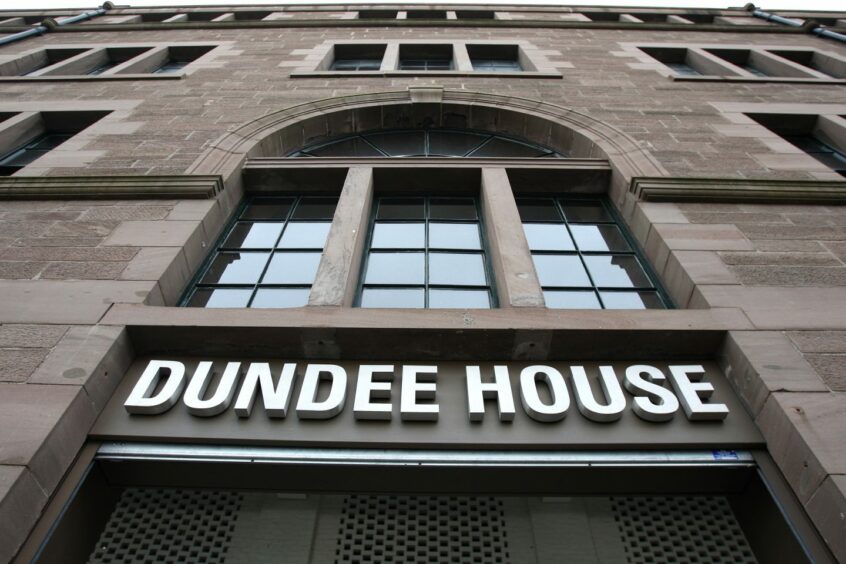photo shows Dundee House sign above entrance to Dundee City Council HQ.