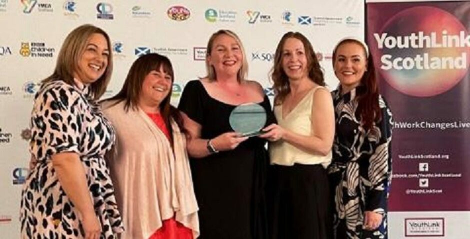 Elaine Glennie, Jill Boni, Shelley Brandie and Jennifer Miller of Angus Council) with Kayleigh Wilson of Showcase at the awards event.