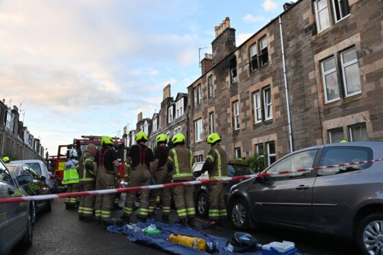 Fire fighters at a fire in Ballantine Place, Perth.