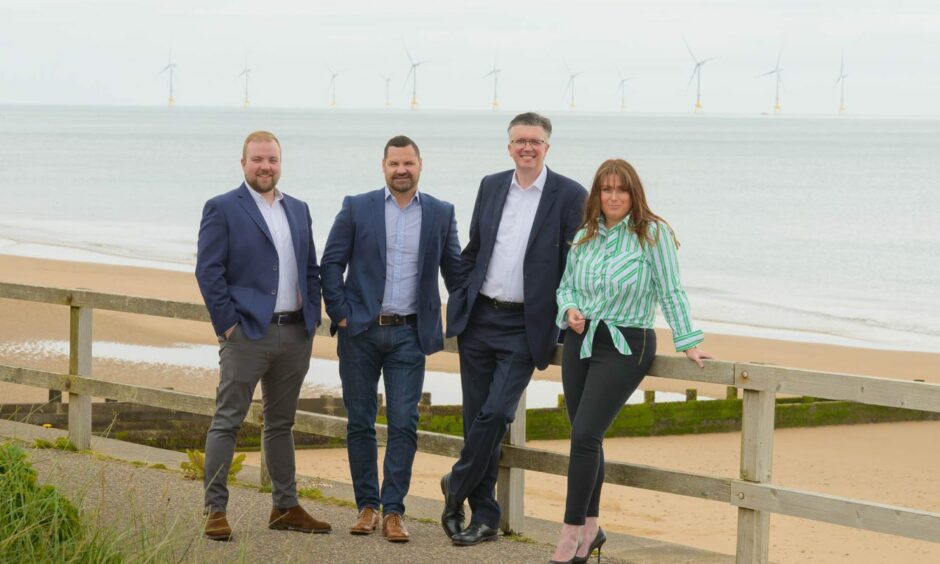 Coast Offshore managing director Michael Leitch and Mark Robson, managing director of Coast Renewables, with Jason Hendry and Sarah Moore of Peterson Energy Logistics.