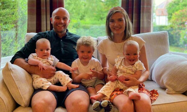 Jamie and Emma Coffey with their sons Ruaridh, Hamish and Campbell.