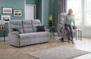 Woman getting up out of a riser recliner chair