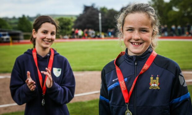 P7 javelin medallists Maia Baker, from Barnhill Primary School, and Anna Sloan, of Forthill. Pictures by Mhairi Edwards/DCT Media.