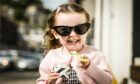 Rora Wheeler, 3, cools down with an ice cream in Dundee