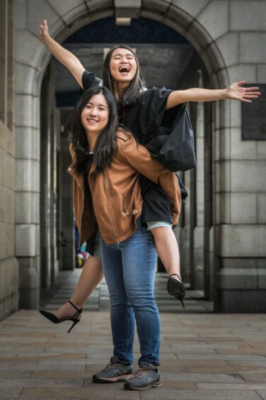 Amanda Koh, 26, graduates in Medicine from 2021 with friend Sabrina Wong.